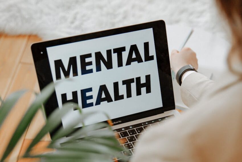 the words mental health on laptop screen